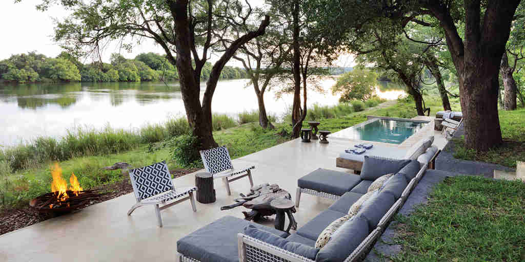 Safari river house deck with fire