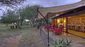 karisia tumaren camp outside decking yellow zebra safaris
