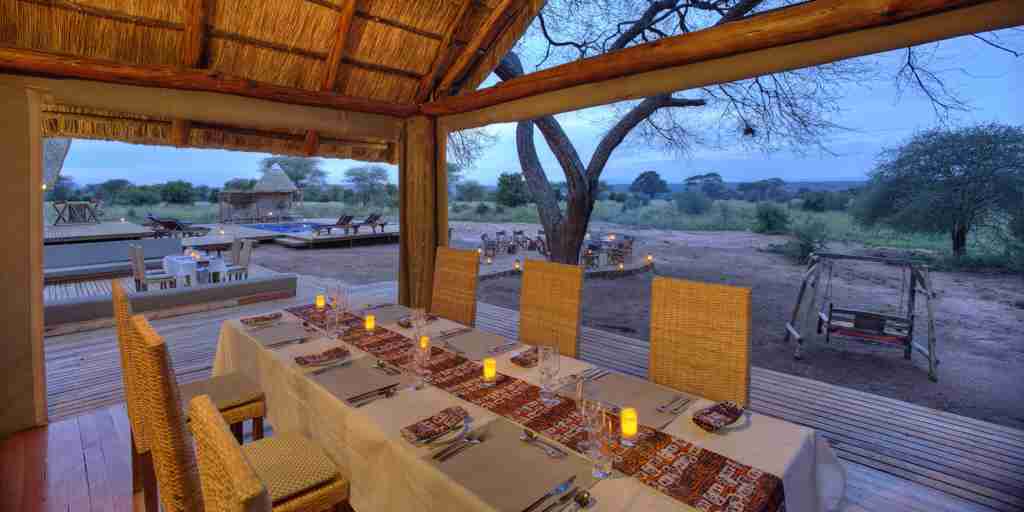 nasikia ndovu tented camp dining tanzania yellow zebra safaris