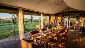 dining, camp fire, lemala mara, the serengeti, tanzania