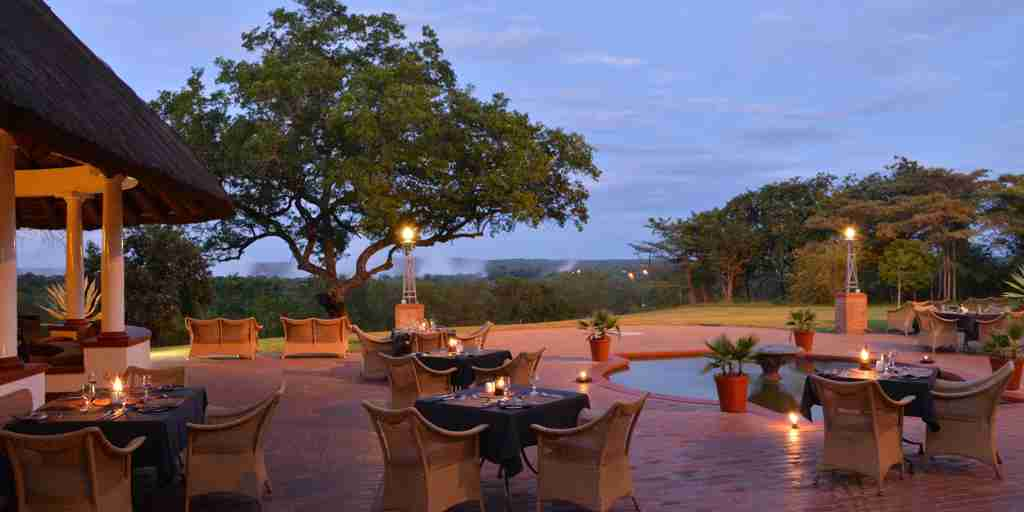 outdoor dining,  victoria falls hotel, zimbabwe