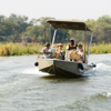 boat in the lower zambezi national park, zambia safaris