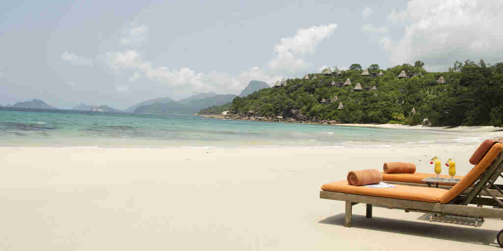 Maia Luxury Resort & Spa   Beach With Deck Chairs