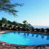 01   Exterior View with Pool and Plains