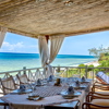 09 Alfajiri Cliff dining area + beach   Version 2