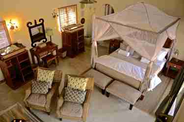 15. Imvelo Safari Lodges   Camelthorn Lodge   King bed configuration Forest Villa