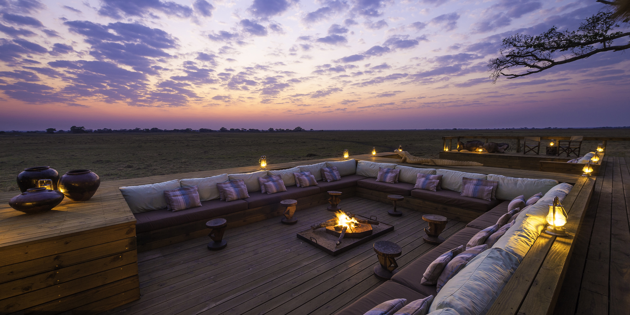 campfire at sunset, kafue national park safaris