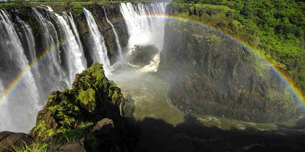 rainbow over victoria falls, zimbabwe safari holidays