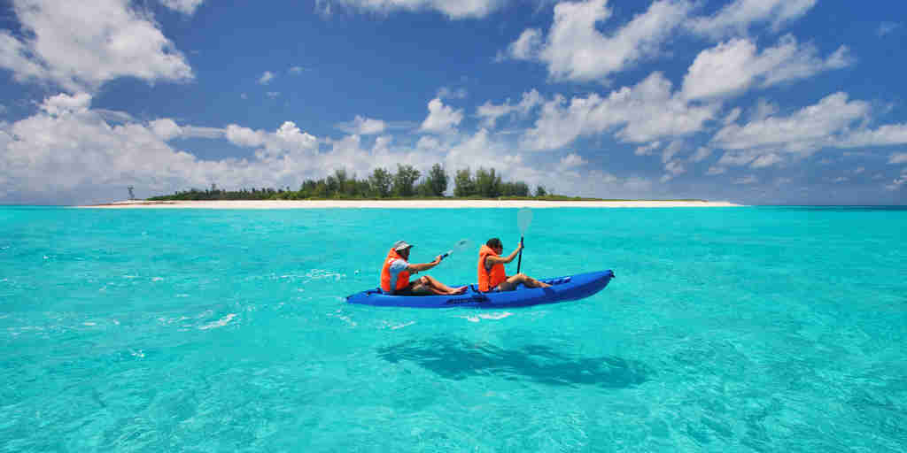 kayaking on bird island, seychelles, africa safaris
