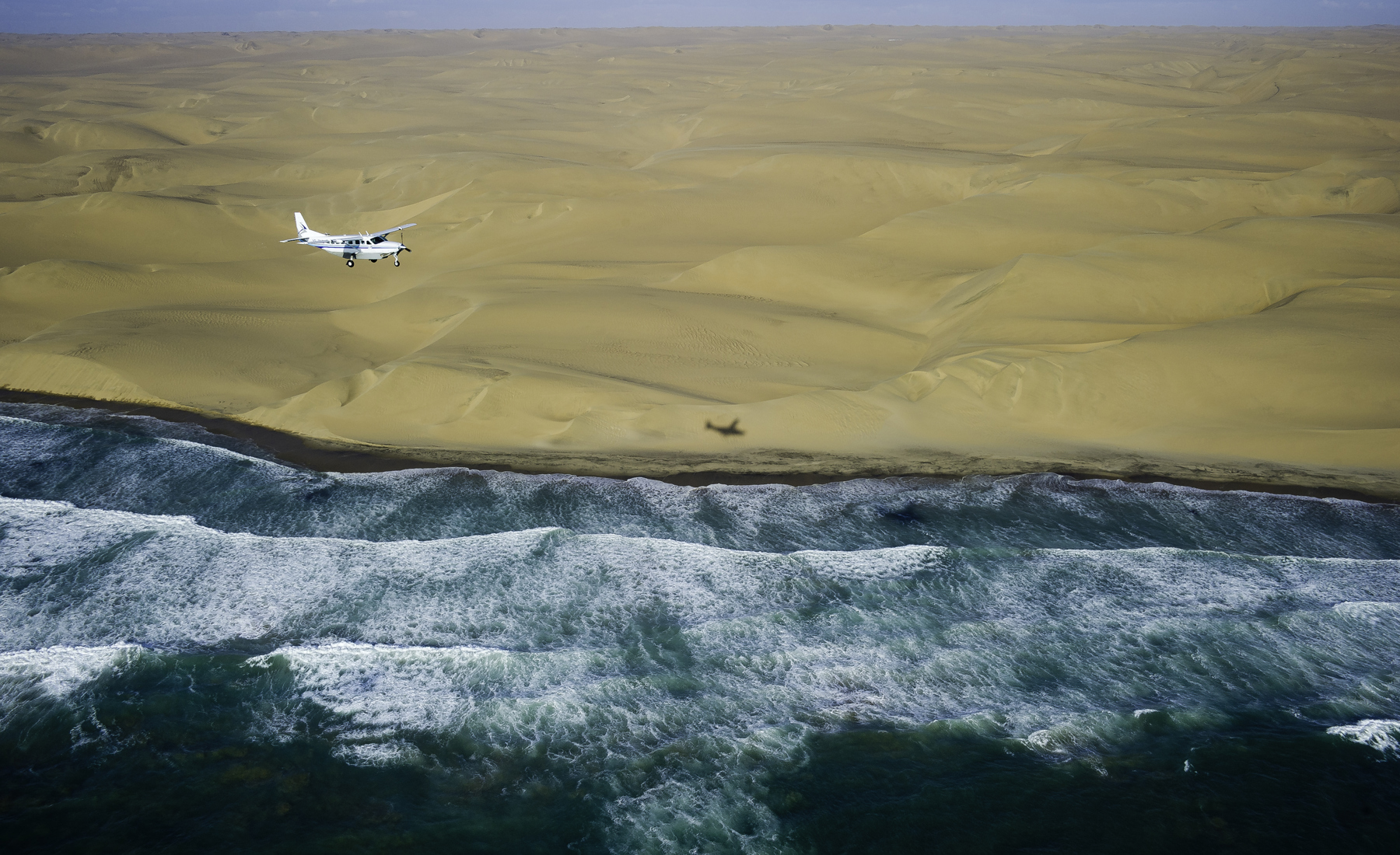flying over the skeleton coast, namibia safaris