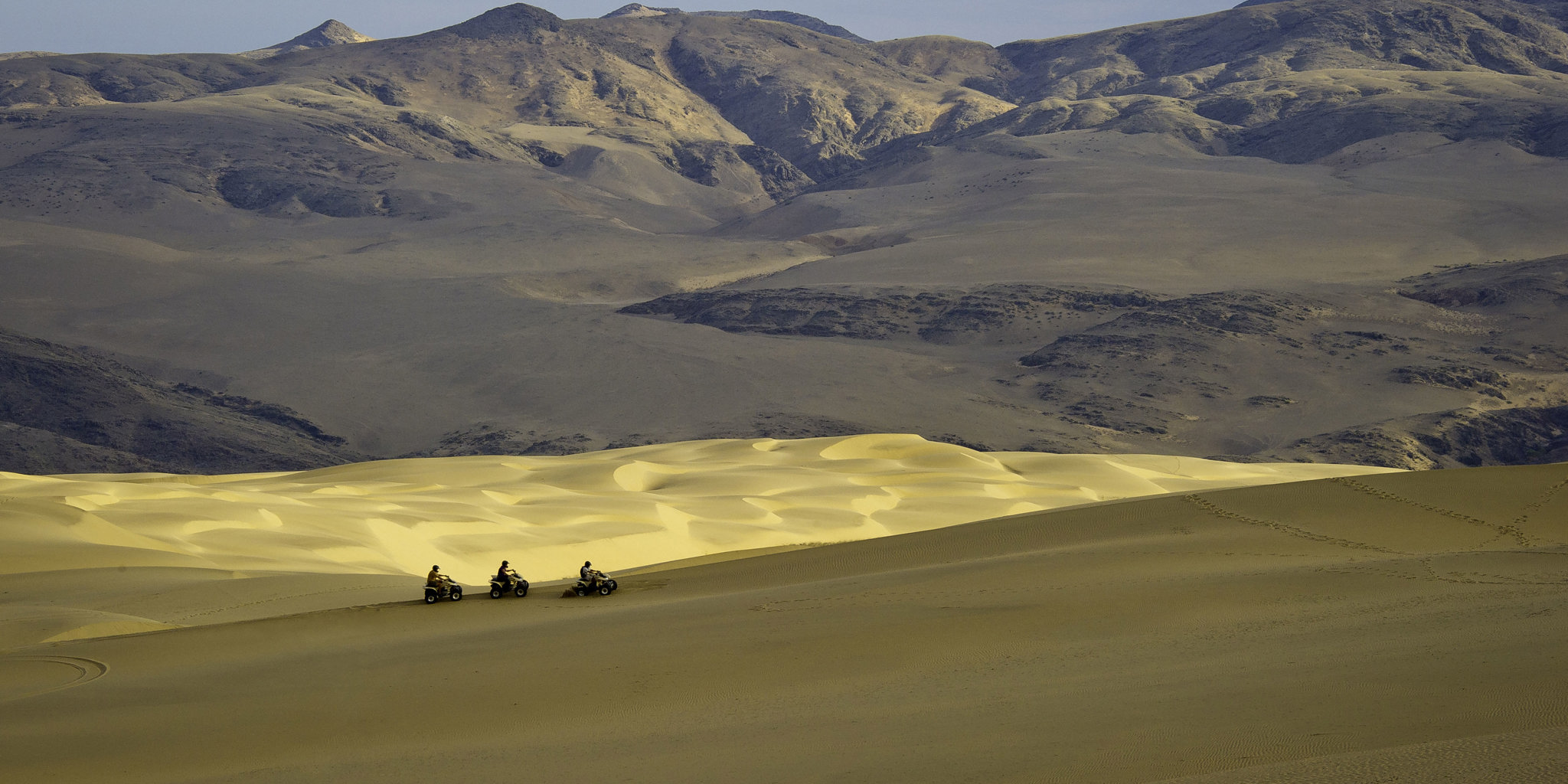 quad biking in kunene river, namibia safari vacations