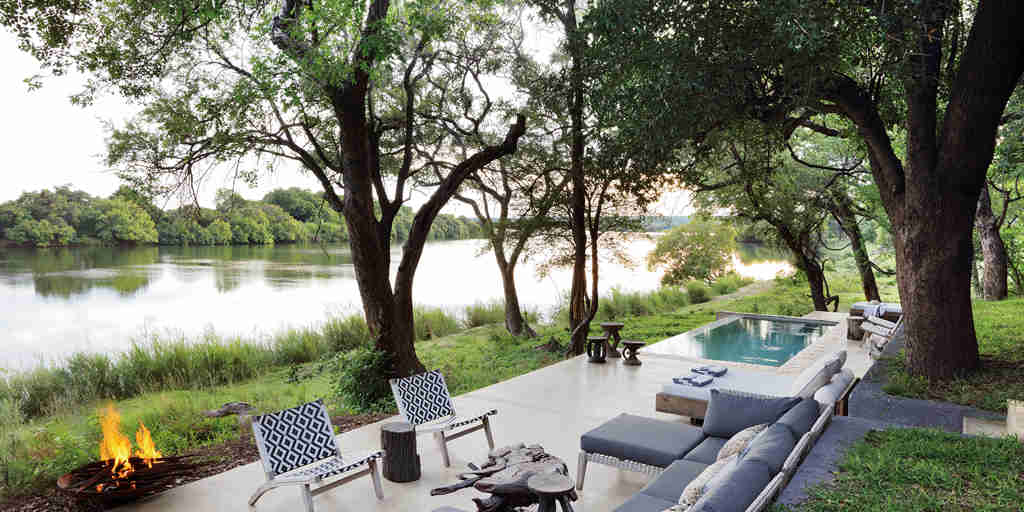Safari river house deck with fire
