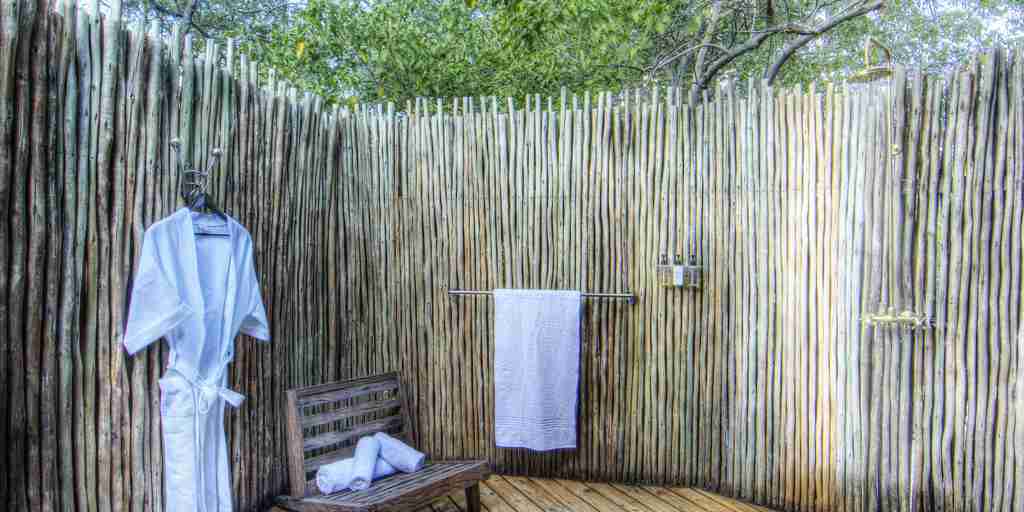 Okuti Botswana open shower