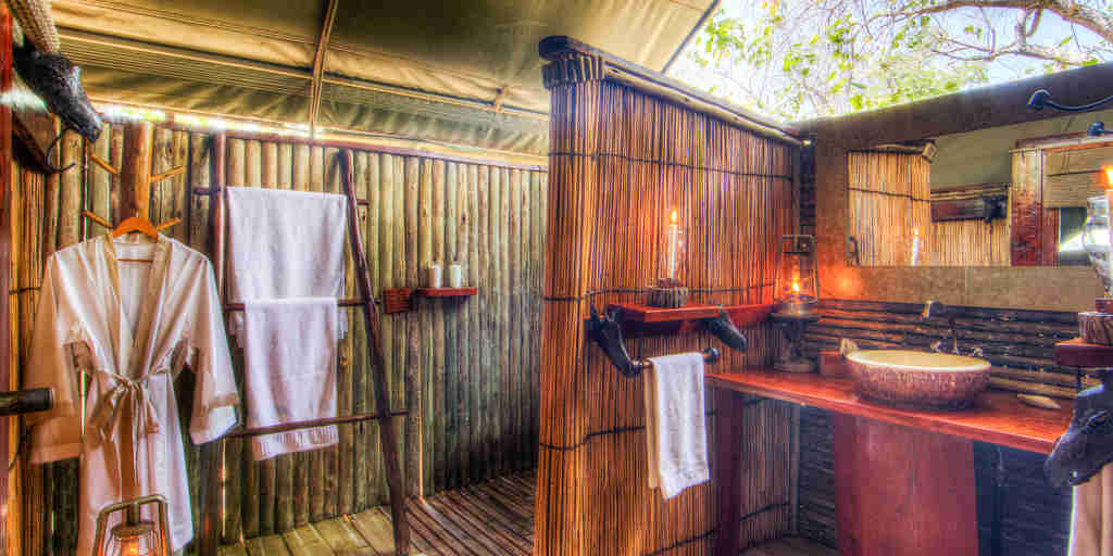 camp xakanaxa guest tent bathroom2