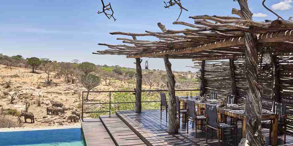dining poolside mwiba lodge tanzania yellow zebra safaris