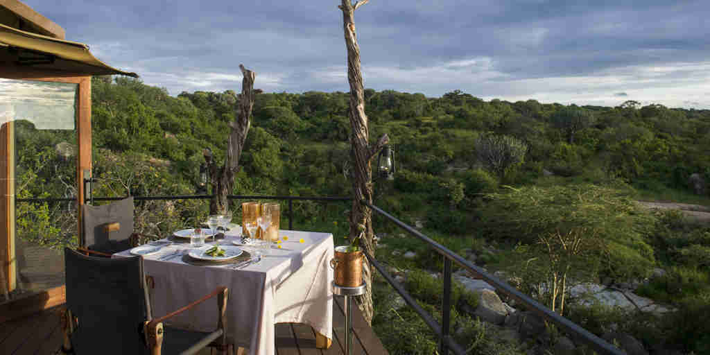 private dinner balcony mwiba lodge tanzania yellow zebra safaris