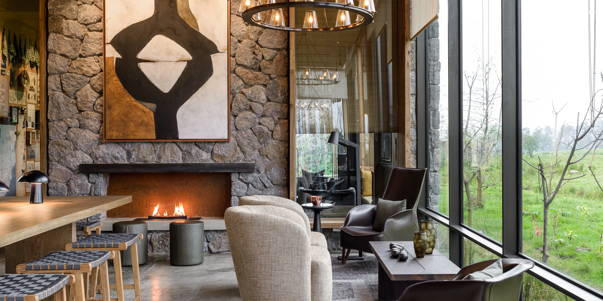 Singita Kwitonda Lodge Lounge Area with Fireplace rwanda yellow zebra safaris