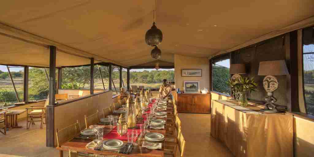 main dining table ol pejeta bush camp kenya yellow zebra safaris