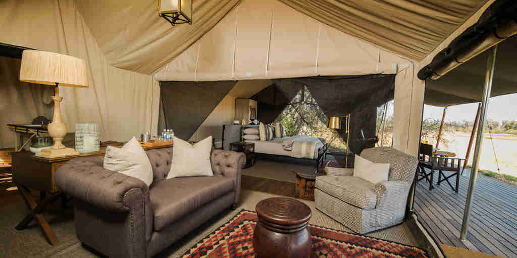 tent living area machaba camp botswana yellow zebra safaris