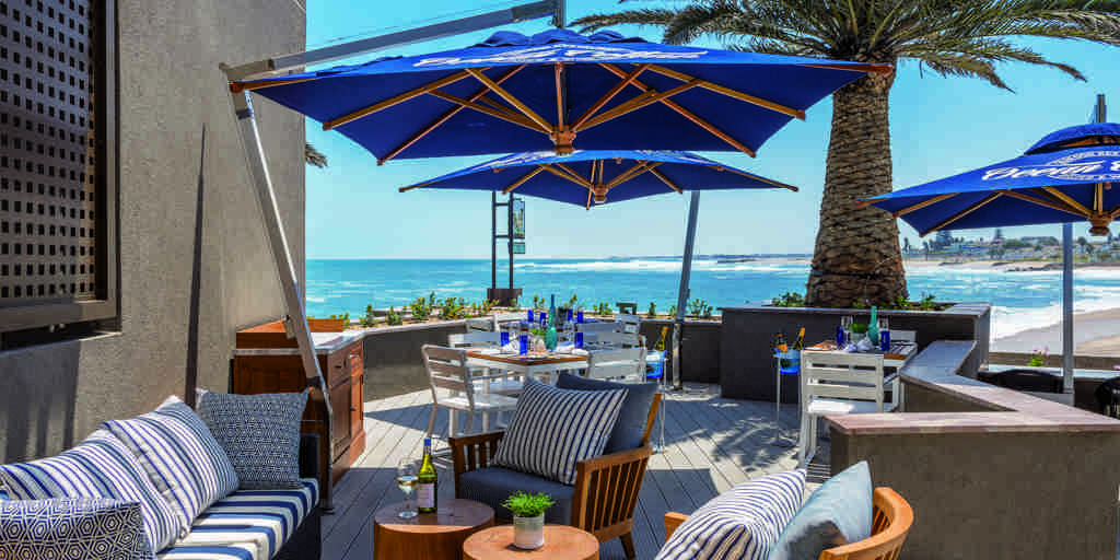 outdoor dining strand hotel swaokpmund namibia yellow zebra safaris