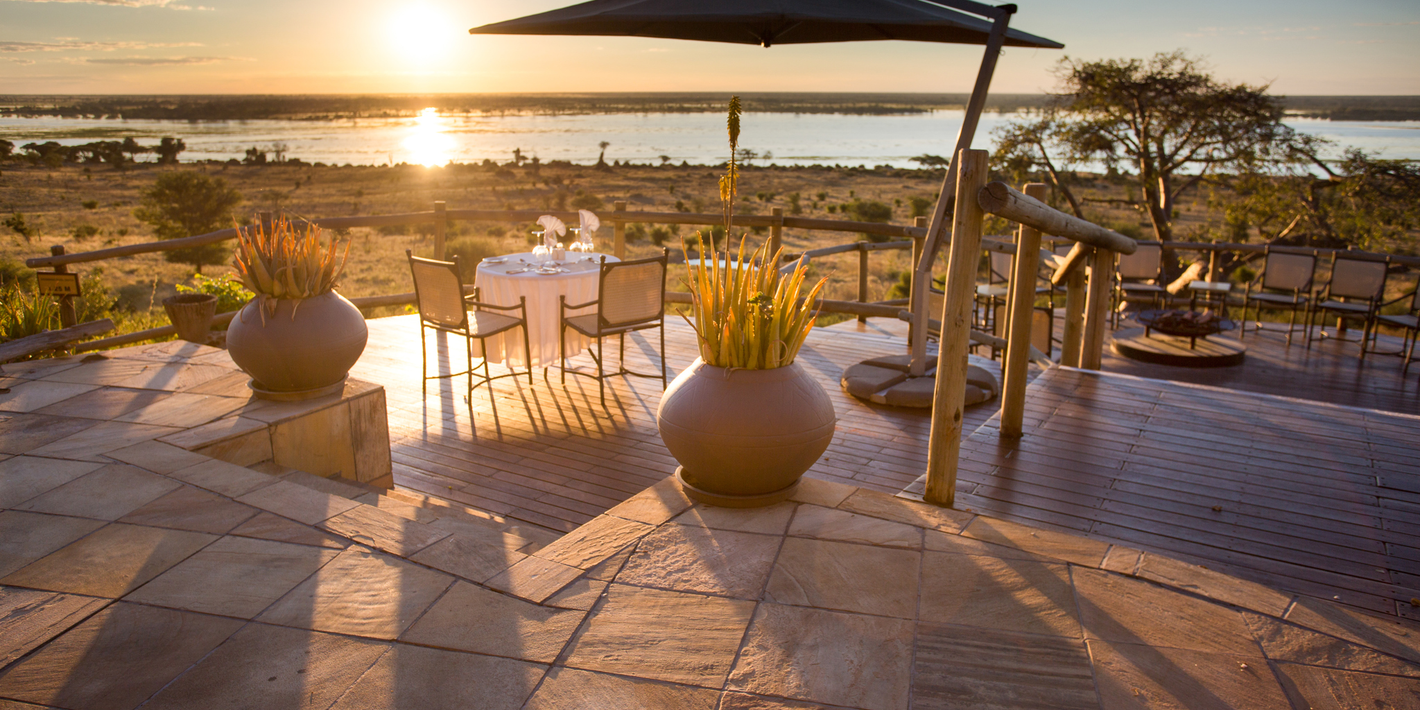 ngoma safari lodge sunset decking botswana yellow zebra safaris