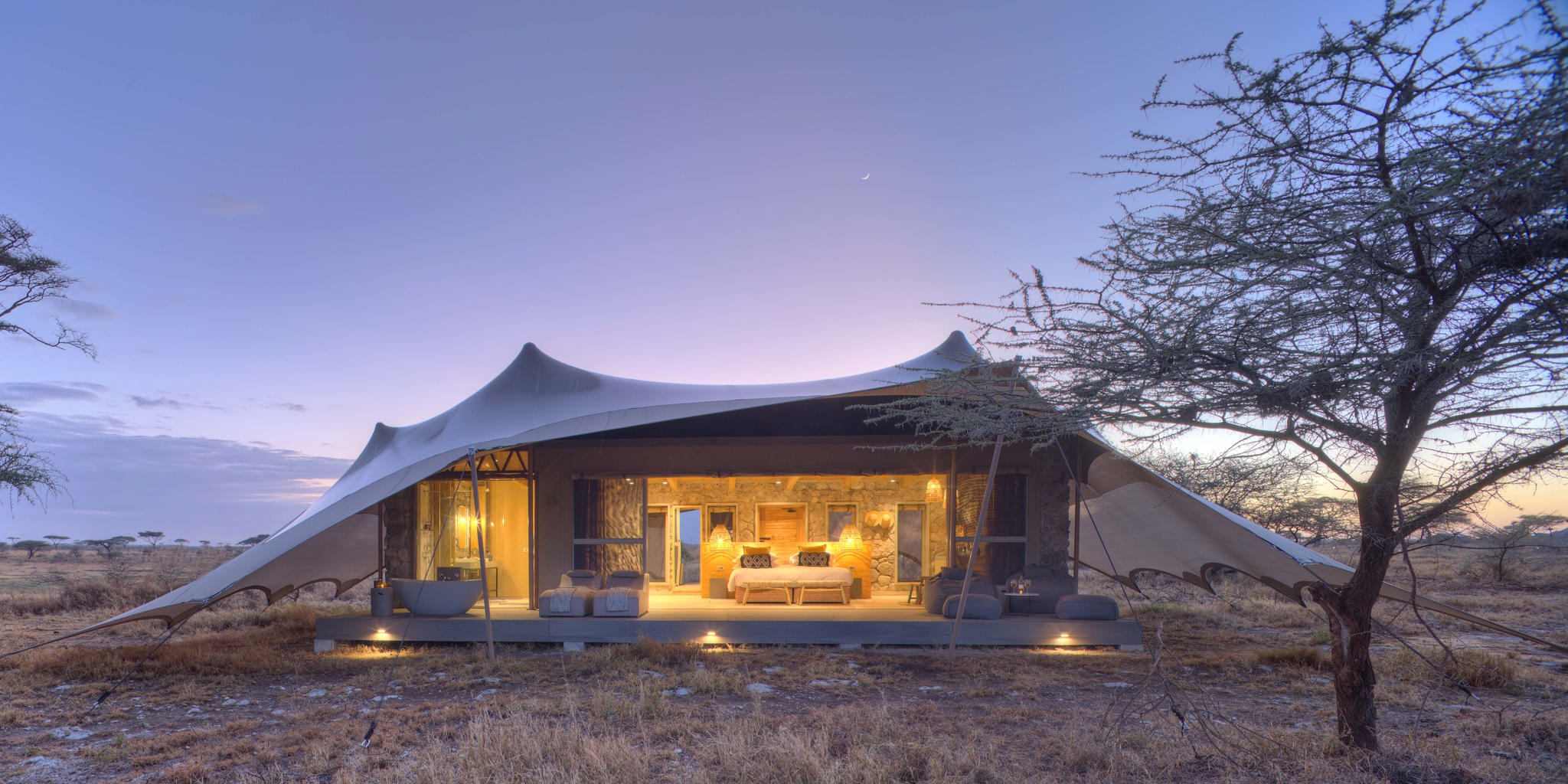 tent exterior dawn namiri plains tanzania yellow zebra safaris