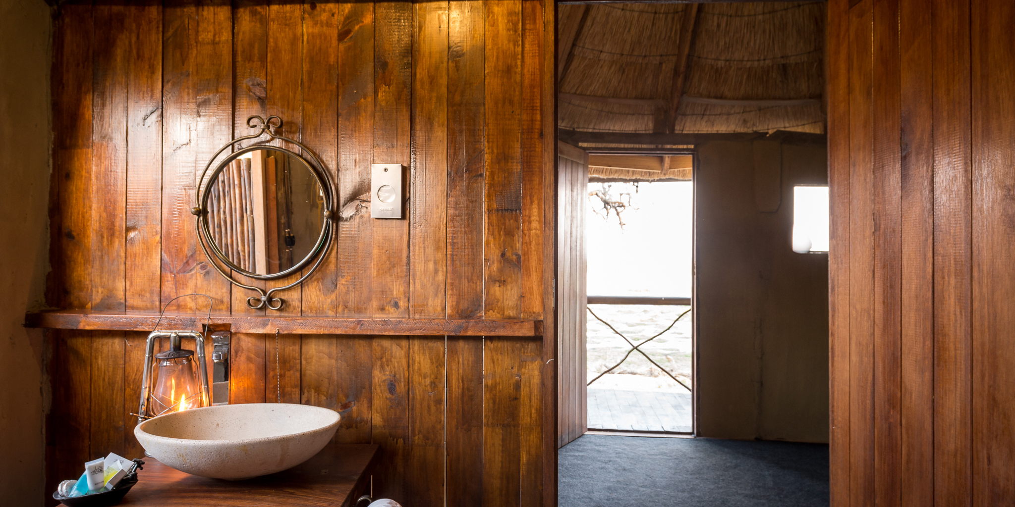 camp linyanti botswana bathroom yellow zebra safaris