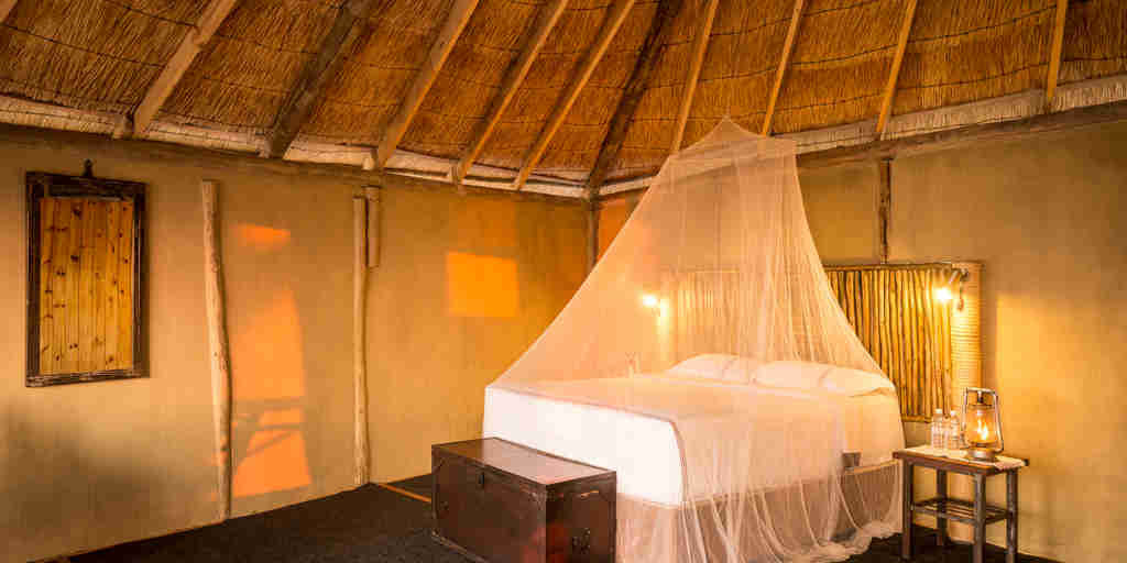 camp linyanti botswana bedroom yellow zebra safaris