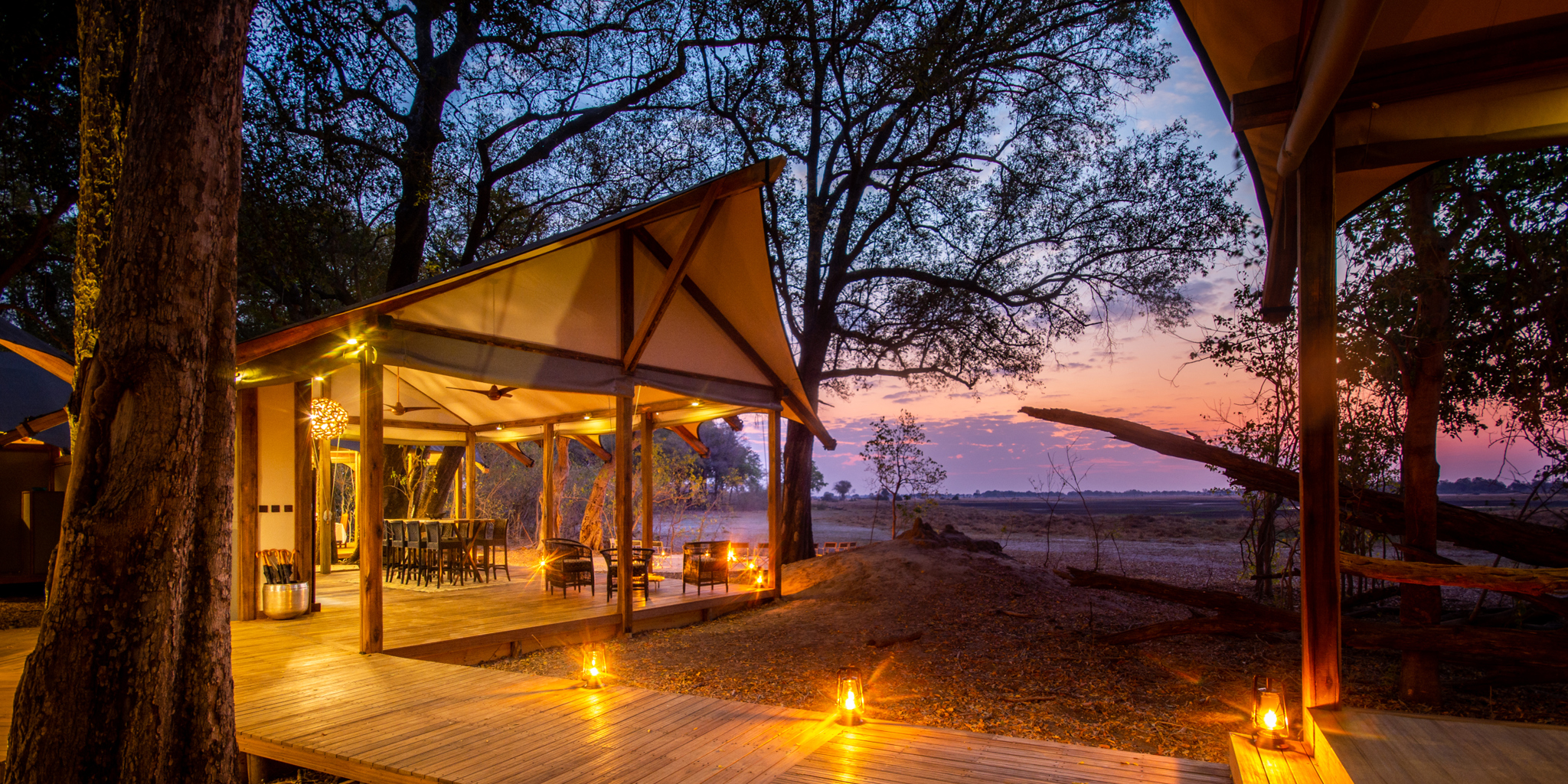 kwara camp main area sunset botswana yellow zebra safaris