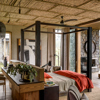 singita kataza house rwanda bedroom yellow zebra safaris
