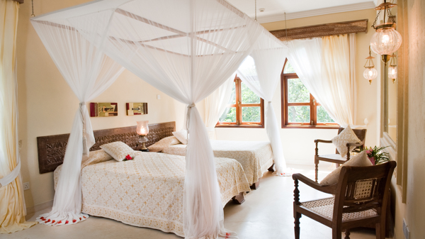Almanara villas twin bedroom kenya yellow zebra safaris
