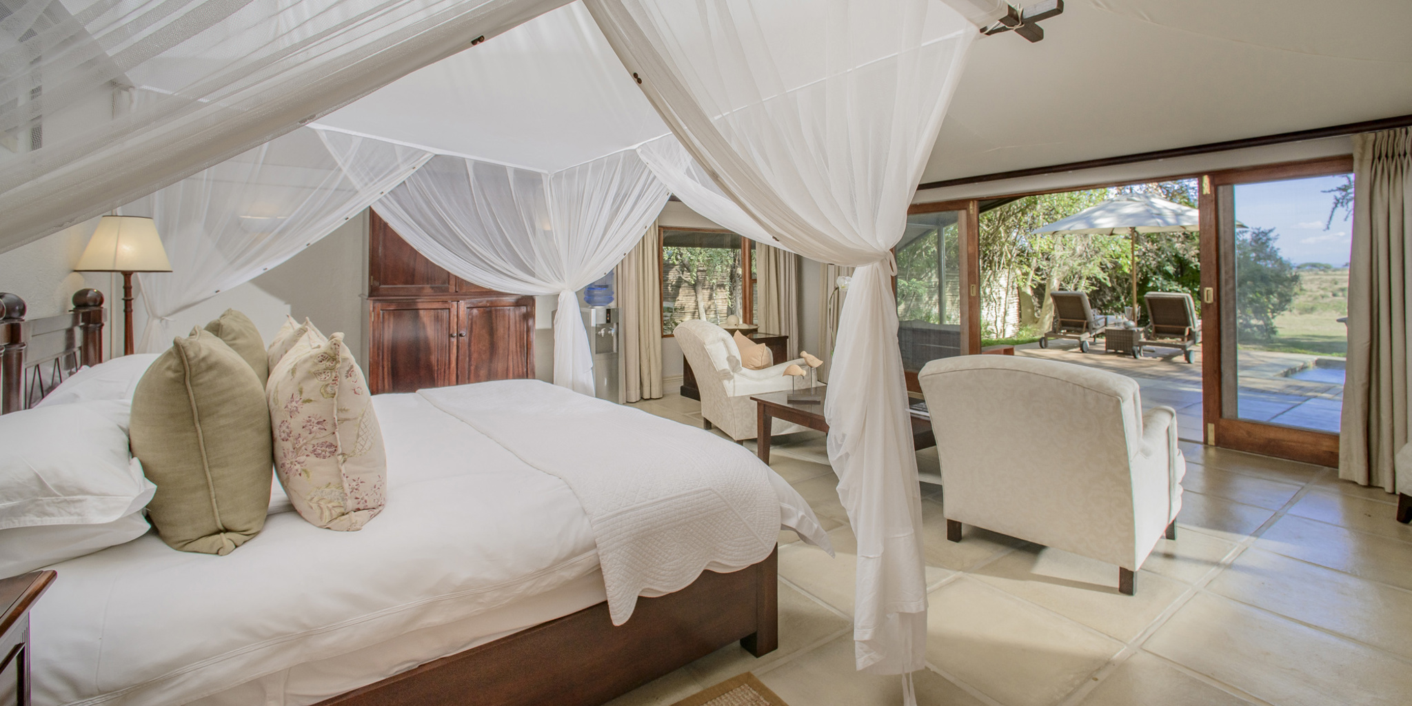 savanna private game reserve luxury bedroom yellow zebra safaris