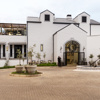 am weinberg hotel entrance namibia yellow zebra safaris
