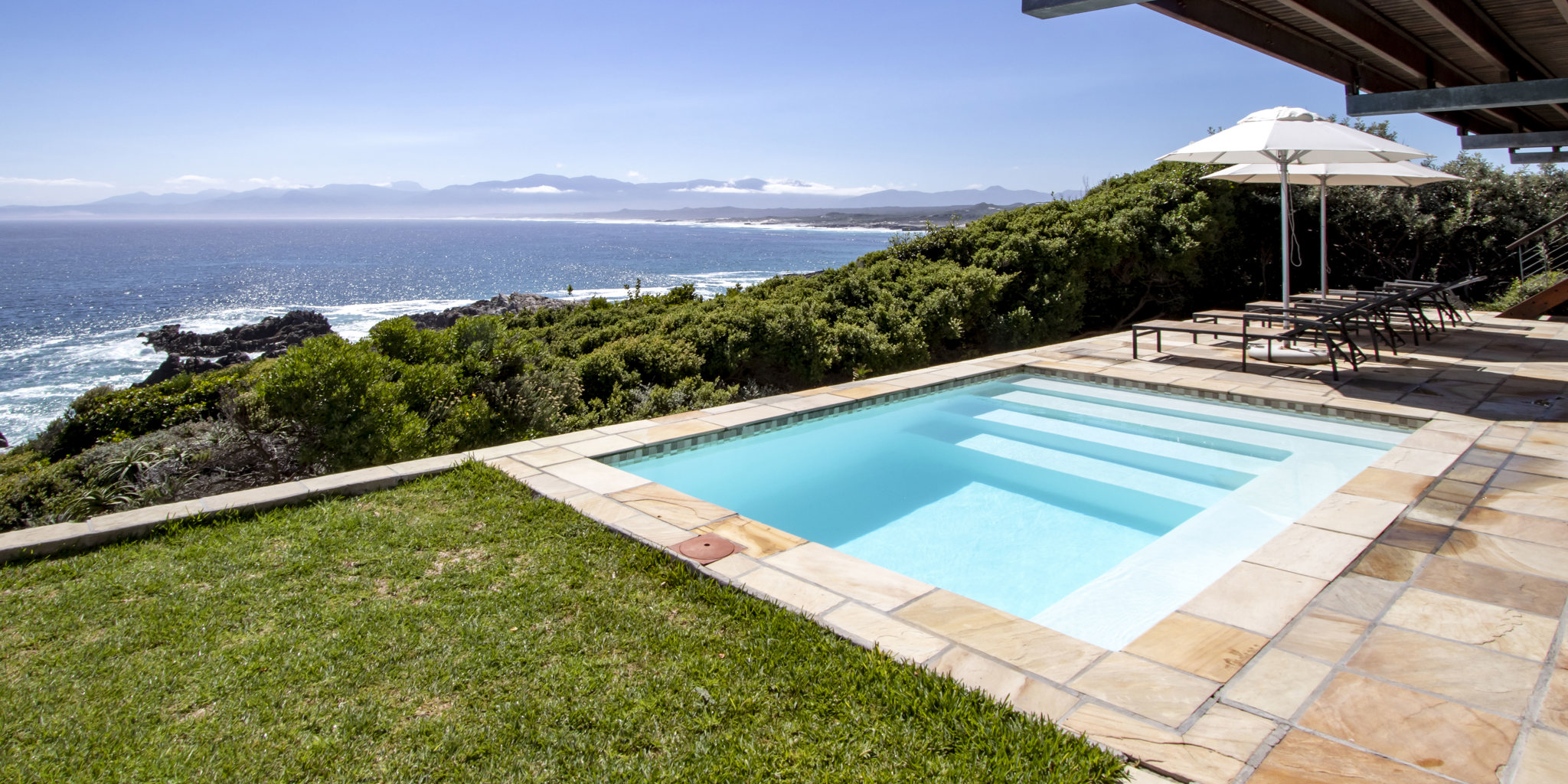 cliff lodge south africa pool yellow zebra safaris