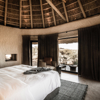 omaanda windhoek namibia bedroom view yellow zebra safaris