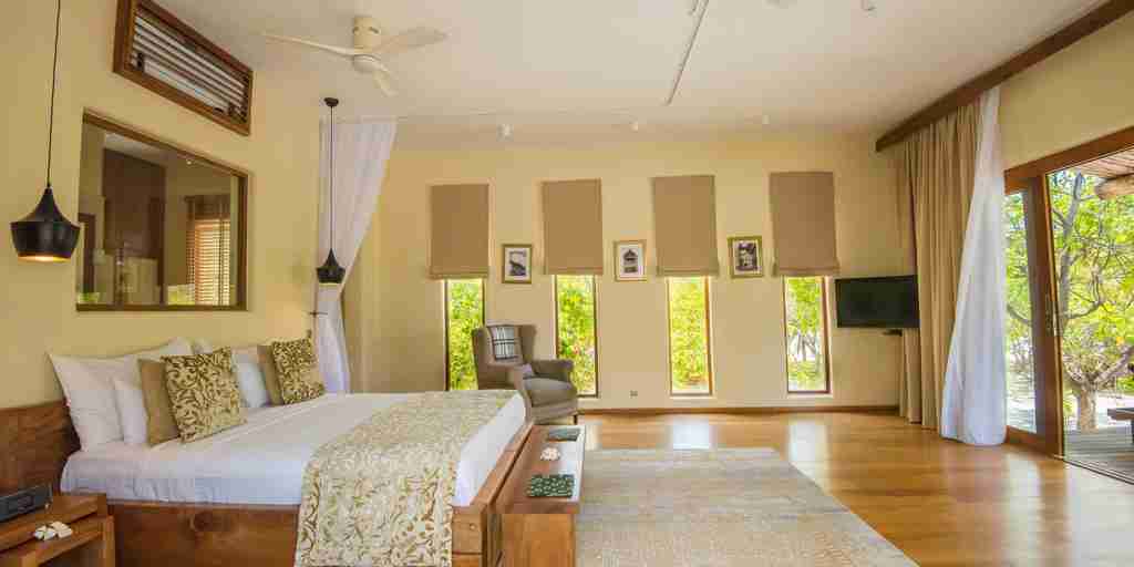 white sand villas double bedroom tanzania yellow zebra safaris