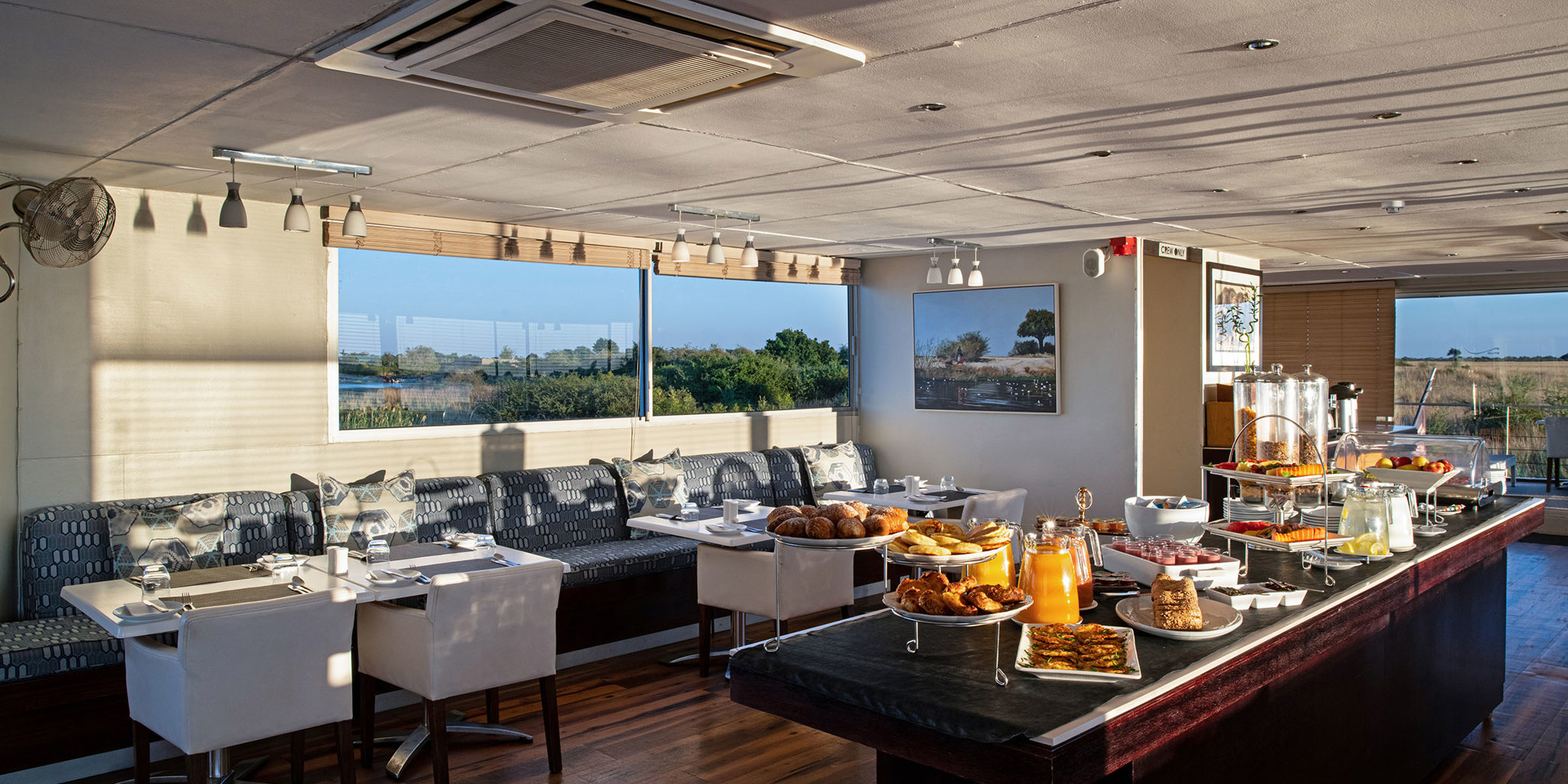 Zambezi queen dining botswana yellow zebra safaris