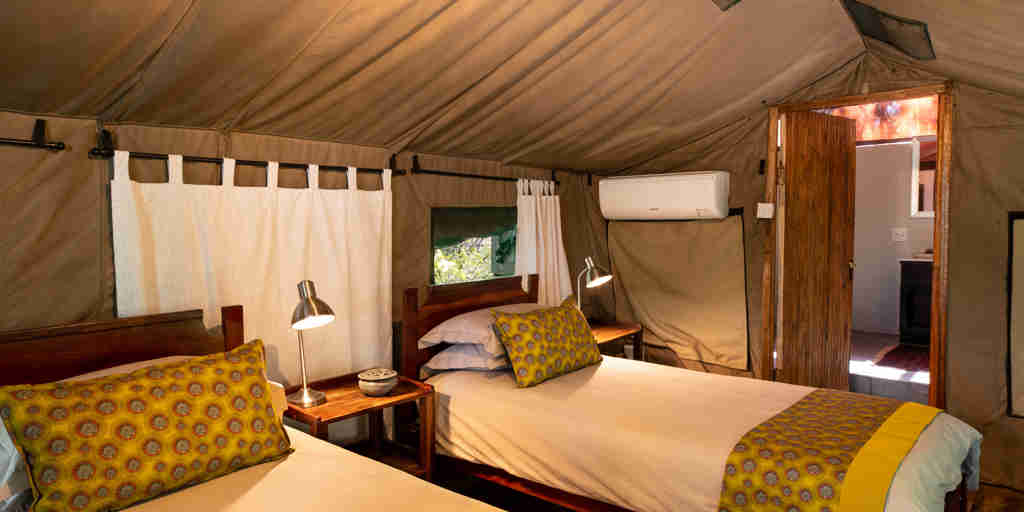 ichingo chobe river lodge twin bedroom botswana yellow zebra safaris