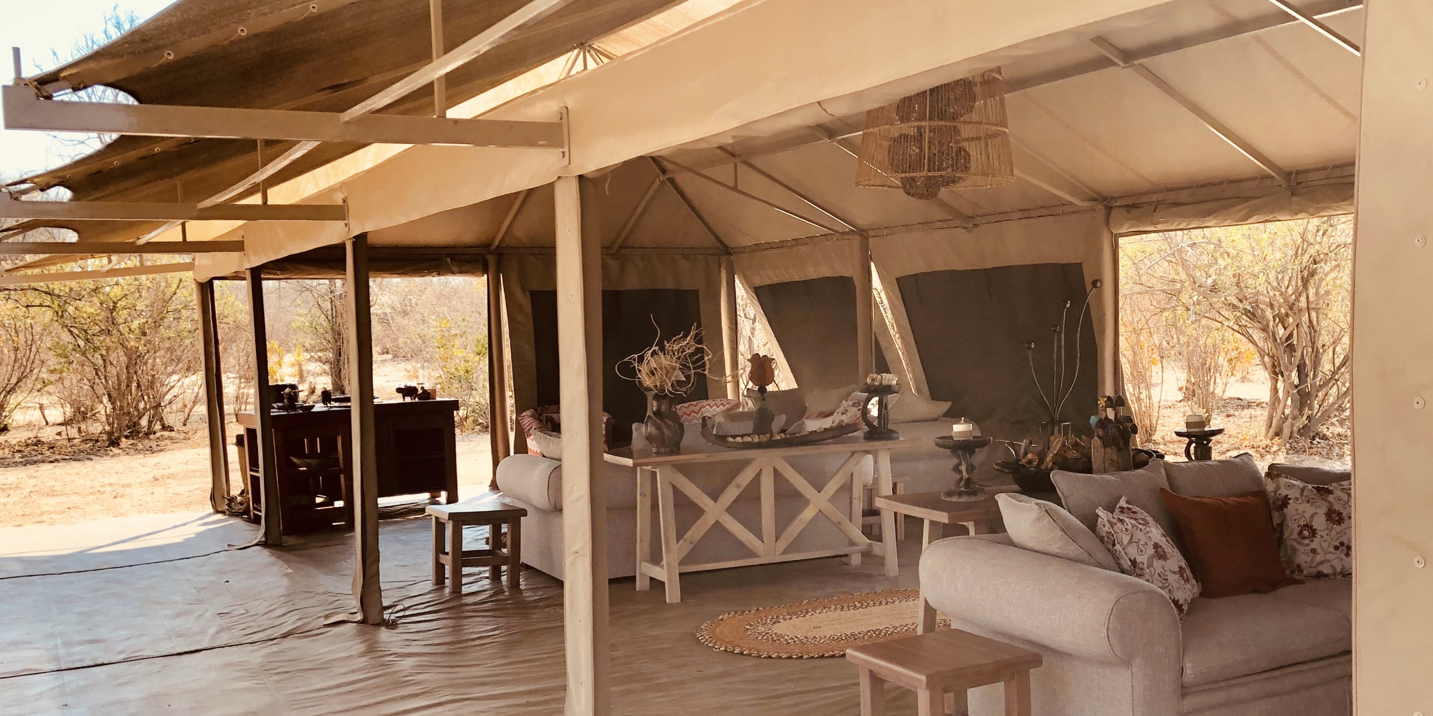 ingwe pan camp lounge yellow zebra safaris
