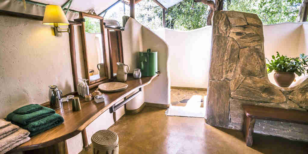kitich forest camp bathroom kenya yellow zebra safaris