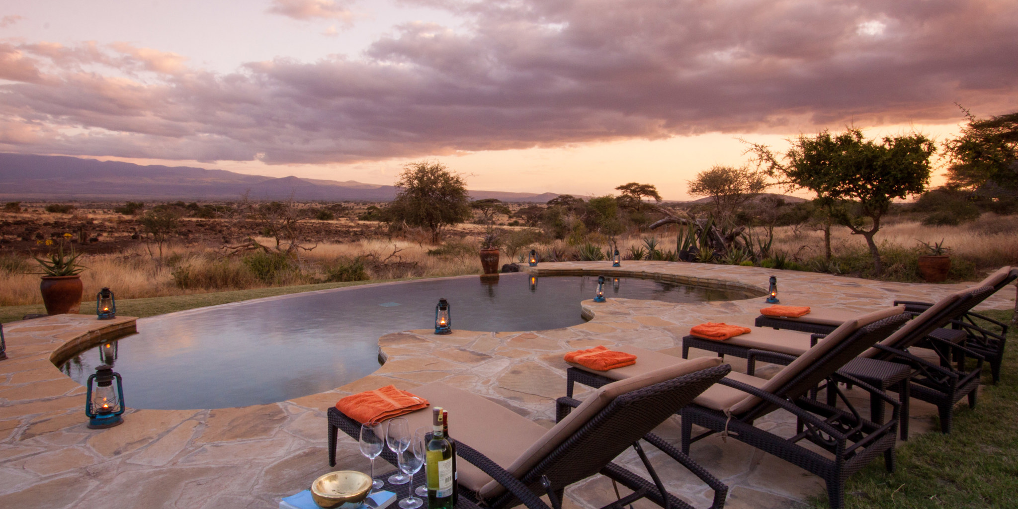 tortilis camp pool area kenya yellow zebra safaris