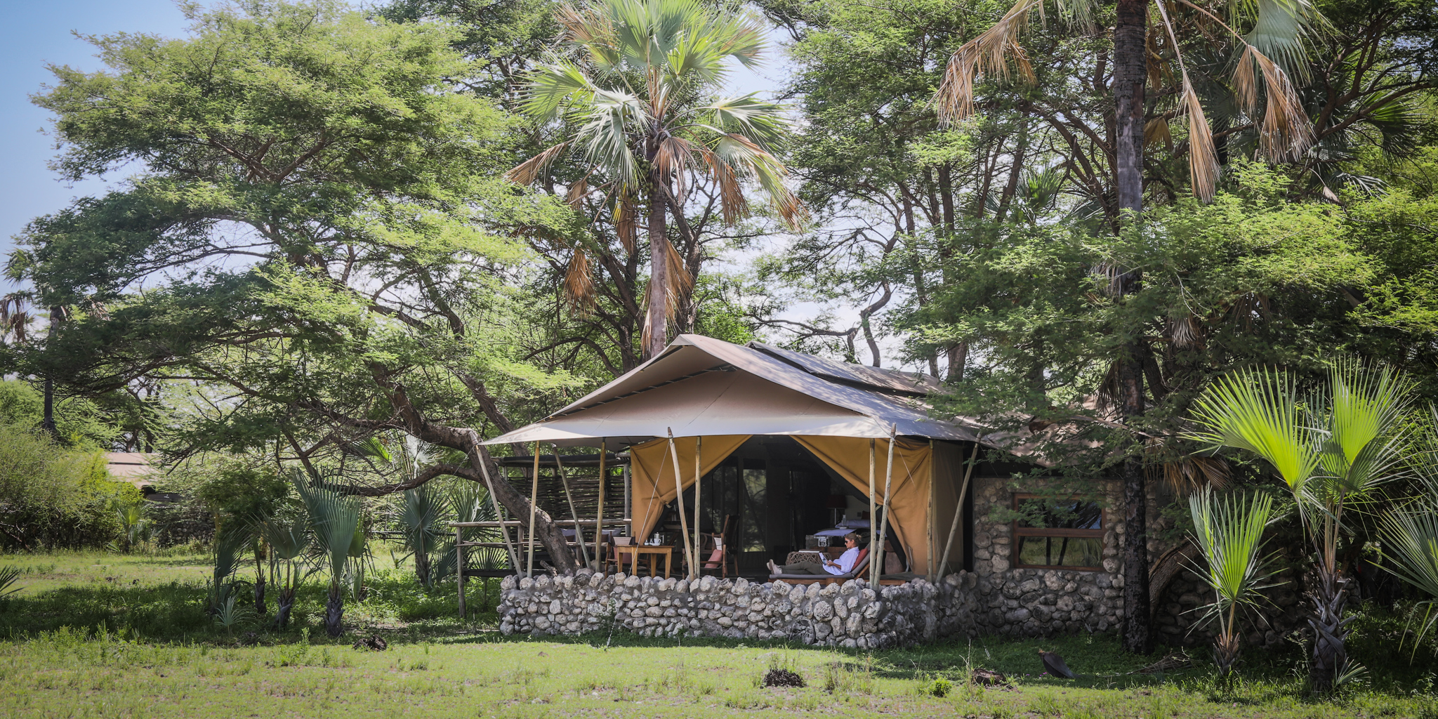 chem chem safari lodge tent exterior tanzania yellow zebra safaris