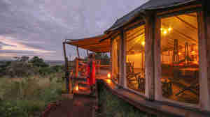 kilima camp tent exterior kenya yellow zebra safaris