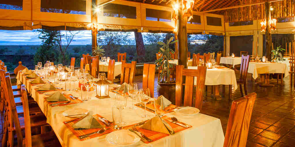Tipilikwani Mara Camp dining room kenya yellow zebra safaris