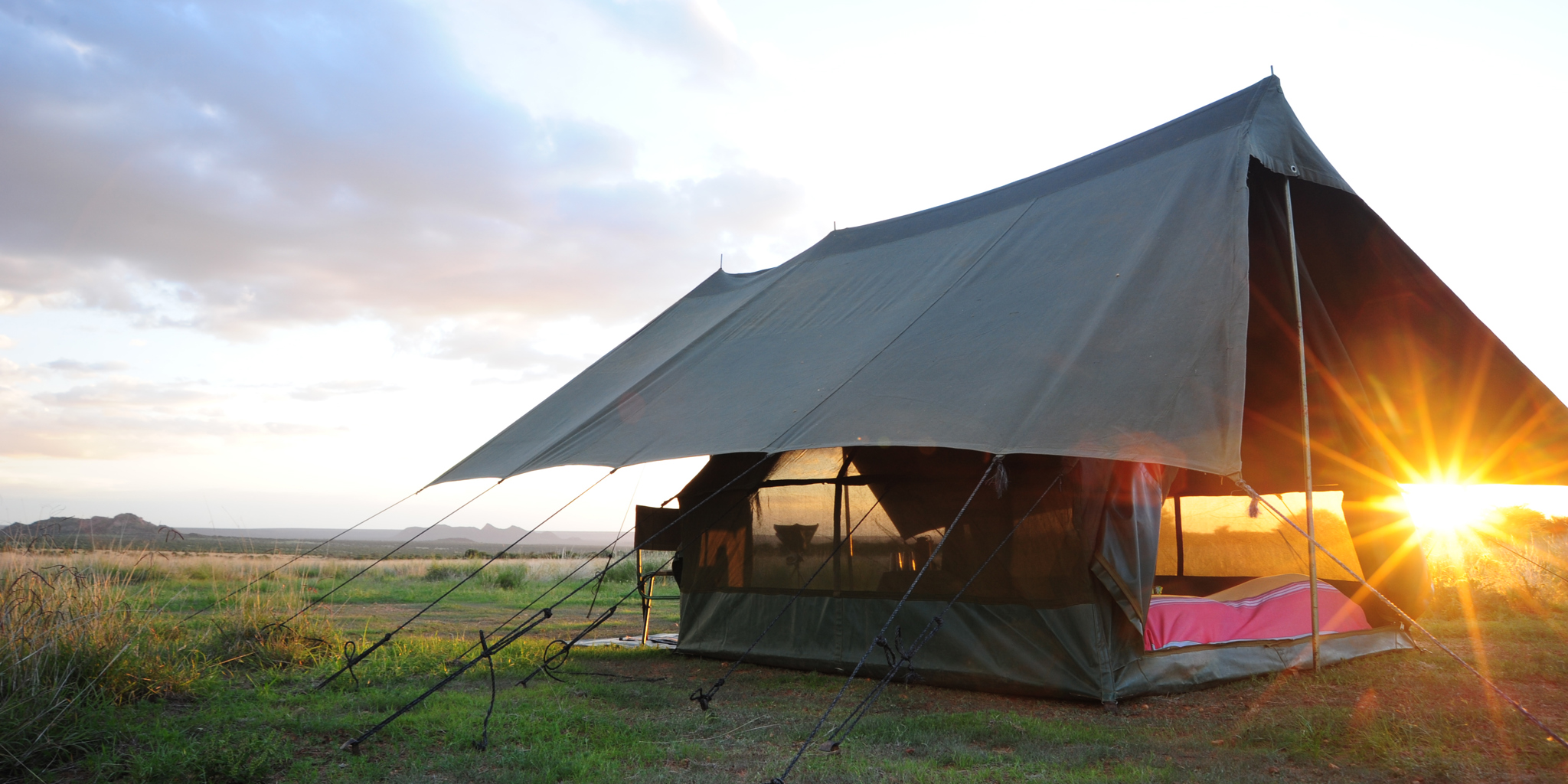 karisia walking safaris tent sunset yellow zebra safaris