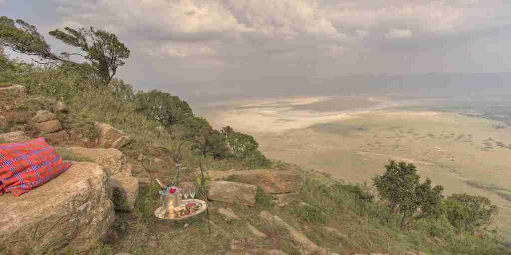 ngorongoro crater lodge sundowners tanzania yellow zebra safaris