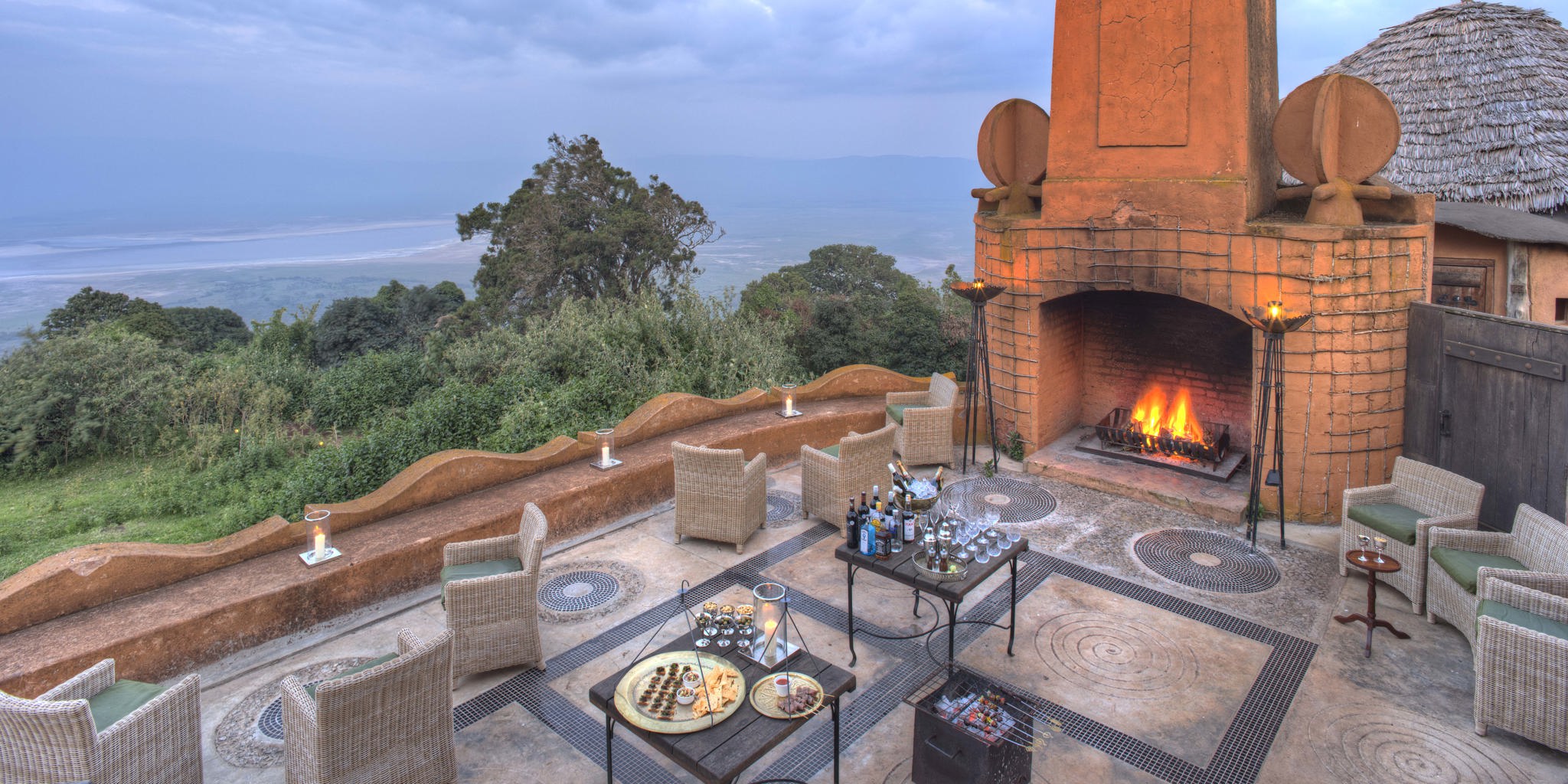 ngorongoro crater lodge guest terrace tanzania yellow zebra safaris