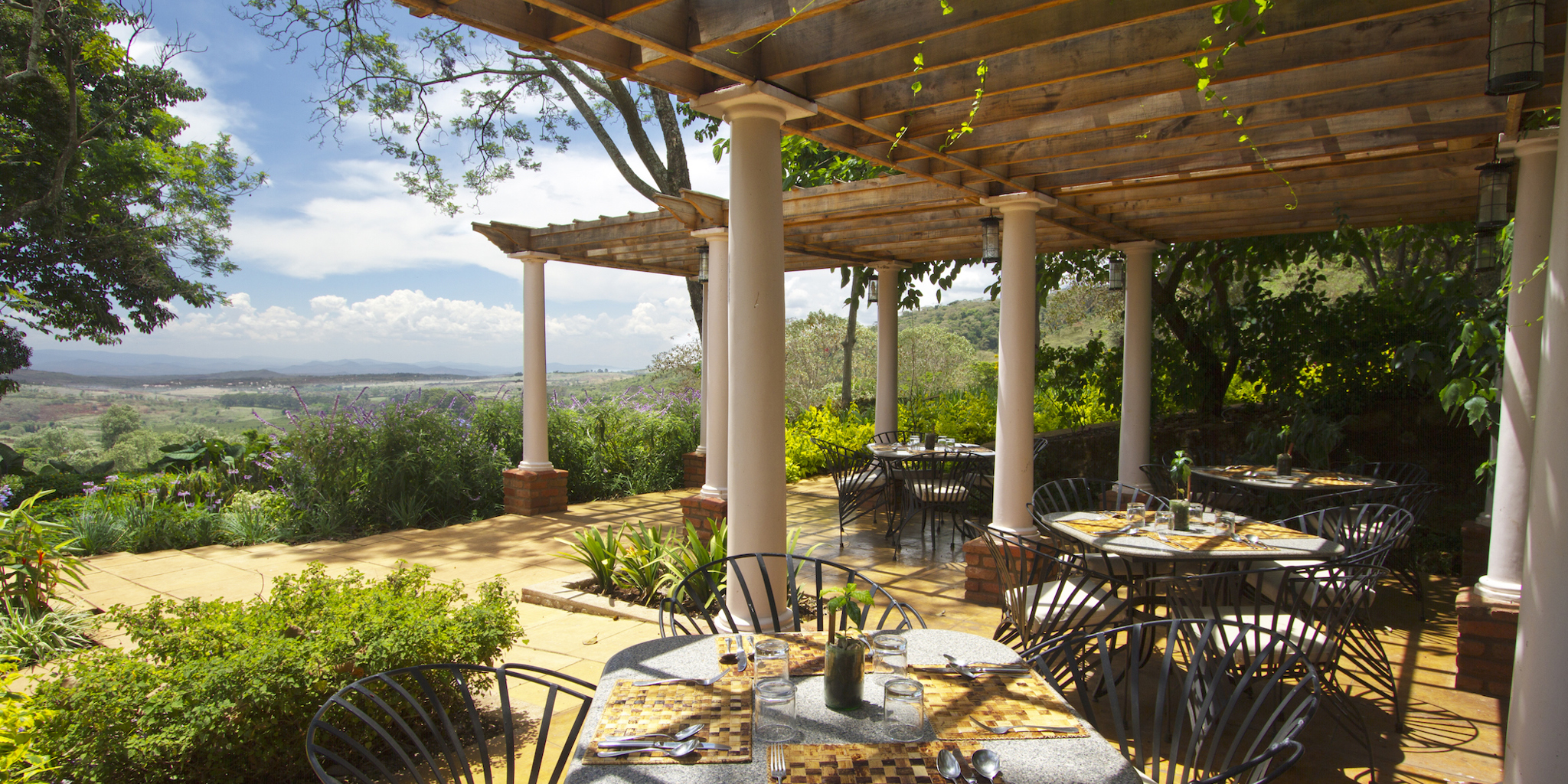 gibb's farm lunch terrace tanzania yellow zebra safaris