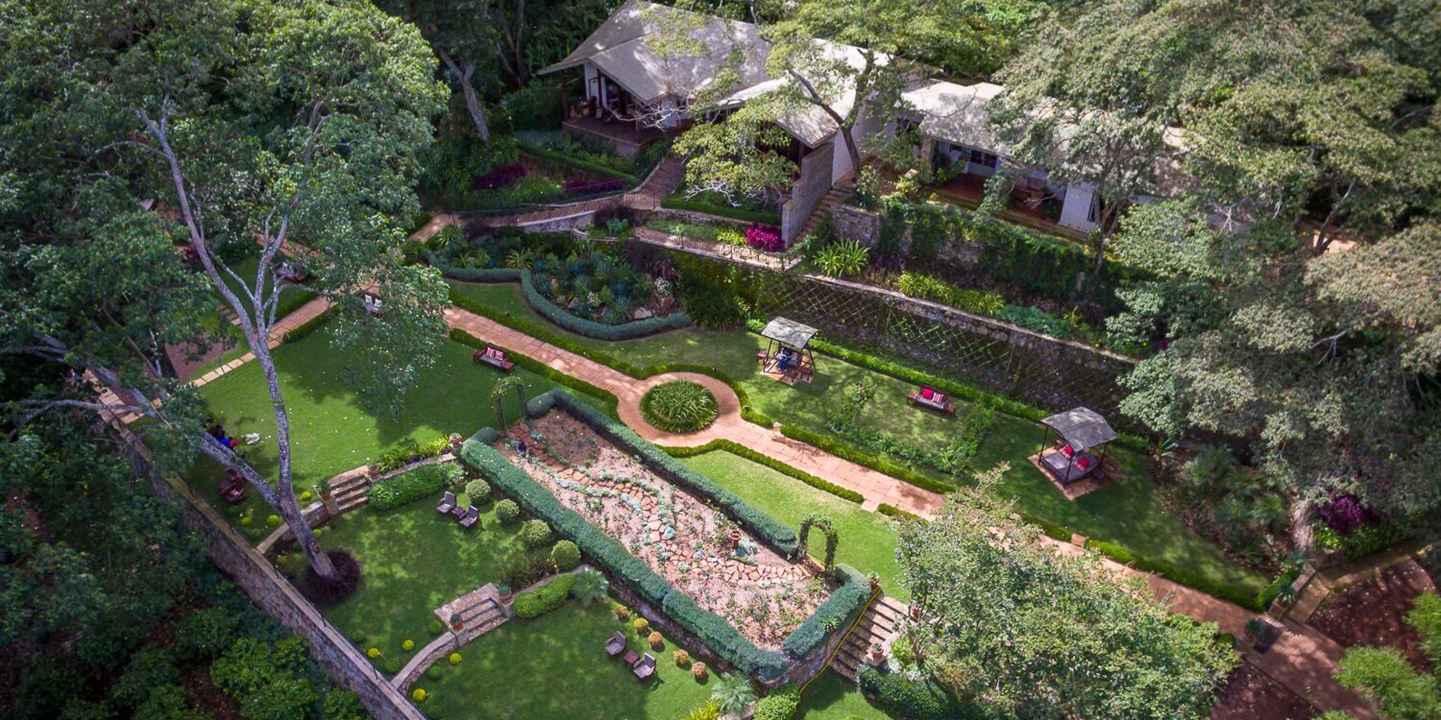 gibb's farm cottage aerial view tanzania yellow zebra safaris