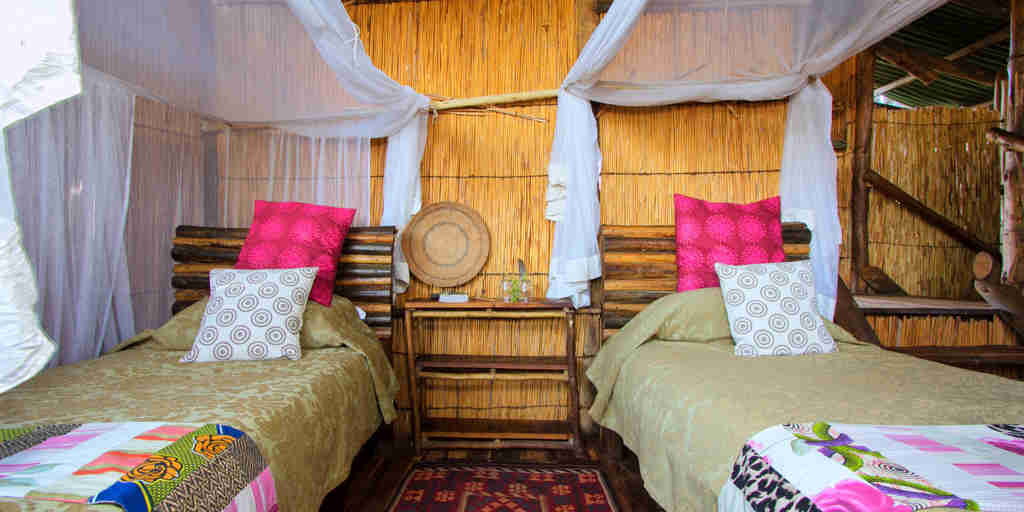 delta camp twin room beds botswana yellow zebra safaris